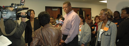 James Tucker, local school council parent leader, speaking to the press about severe overcrowding at South Side Occupational School.